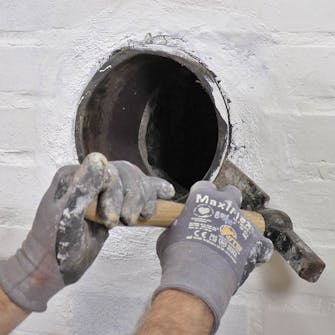 Luk hul efter brændeovn: Fjern kraven Luk hul efter brændeovn: Fjern kraven